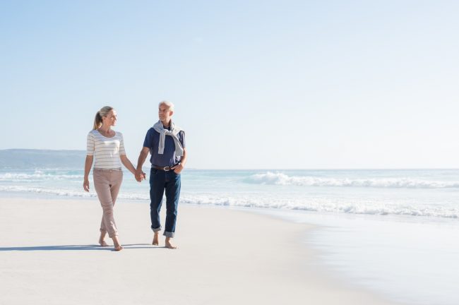 Couple walking at beach