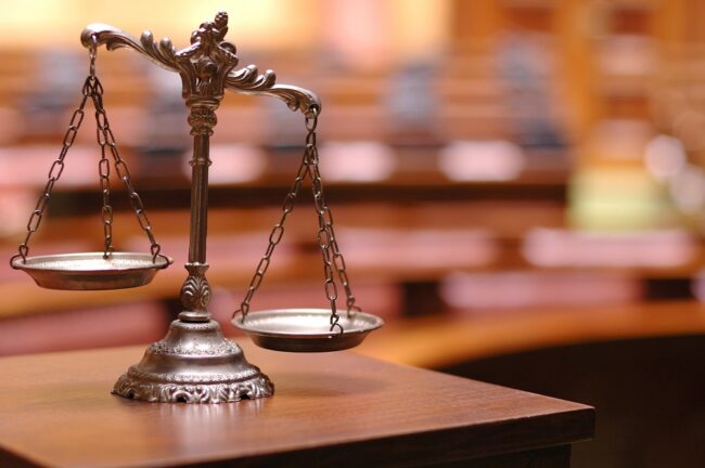Decorative Scales of Justice in the Courtroom